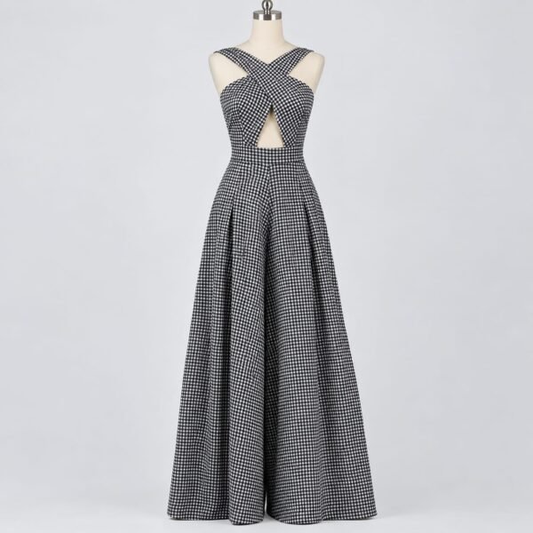 Black and white gingham cross-back palazzo jumpsuit with crossover bodice and wide-leg trousers displayed on a mannequin