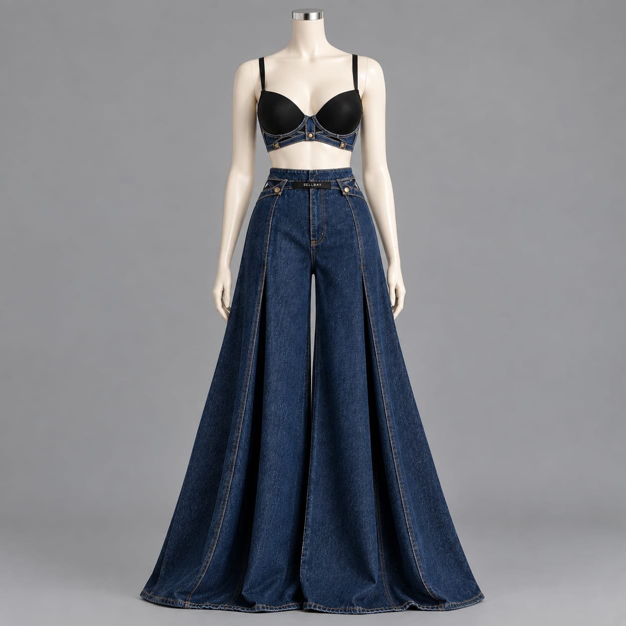 SELLBAY Denim Empress Set featuring a black sculpted bra-style top with structured indigo denim detailing and dramatic floor-length flared denim palazzo trousers on a mannequin.