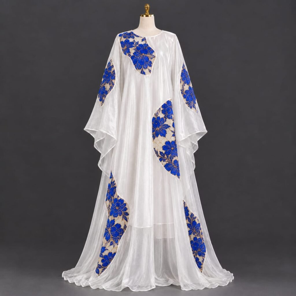 SELLBAY ARABIAN ROYAL BLUE FLORAL ORGANZA KAFTAN in sheer white organza with royal blue floral embroidery and gold thread patchwork
